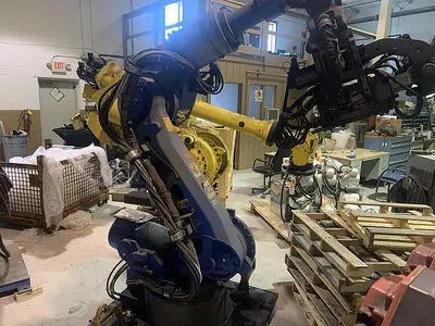 Used YASKAWA MOTOMAN ES165D 6 AXIS CNC ROBOT WITH DX100 CONTROLLER WITH SPOT WELDING GUN Robots | Harbor Machinery Inc. #1283330