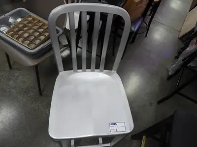 Used Falcon Restaurant Supply Used Aluminum Light Weight Silver Navy Indoor / Outdoor Bar Height Stool with Vertical Slat Back Restaurant Front of House Furnishings Illinois US | Falcon Restaurant Supply #1376610