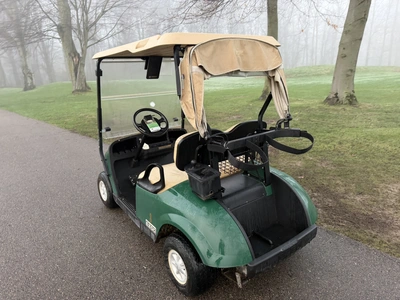 (1) 2015 E-Z-Go golf cart with a Kawasaki gas engine, includes canopy, ball cover, club cover, fold-...