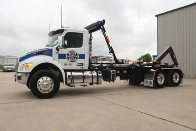 Used 2027 PETERBILT 548 Hooklifts & Roll-Offs Texas US | Roll Off Truck World #1491992