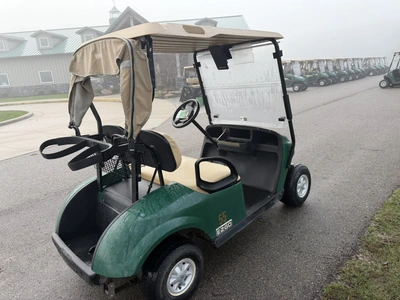 (1) 2017 E-Z-Go golf cart with a Kawasaki gas engine, model 625111G01, includes canopy, ball cover, ...