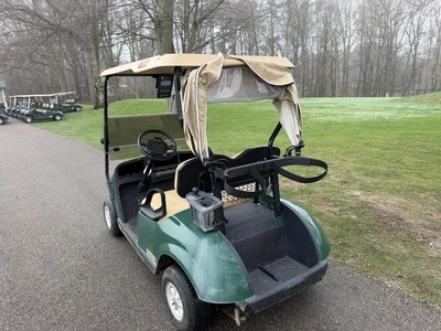 (1) 2015 E-Z-Go golf cart with a Kawasaki gas engine, includes Club canopy, ball washer, fold-down w...