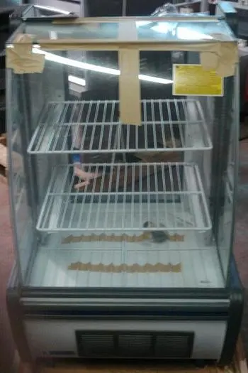 26" WIDE FLOOR MODEL PASTRY DELI CASE - CURVED GLASS FRONT