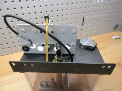 USED USED HAAS PARTS AND TOOLING HAAS 30-30533A  SPINDLE OIL TANK 1 PORT PUMP ASSY W/PROX