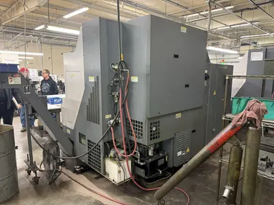 USED 2010 OKUMA LB3000EX-MWY/450