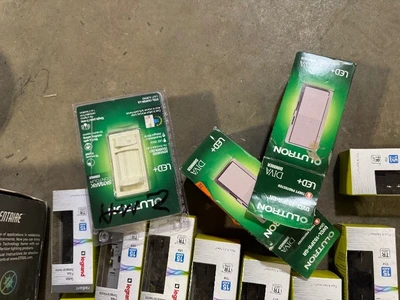 Lot of Outlets and dimmers customer returns see pictures