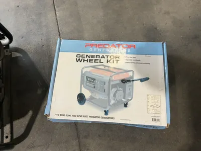 USED PREDATOR 4000 WATT MAX GAS GENERATOR WITH WHEEL KIT