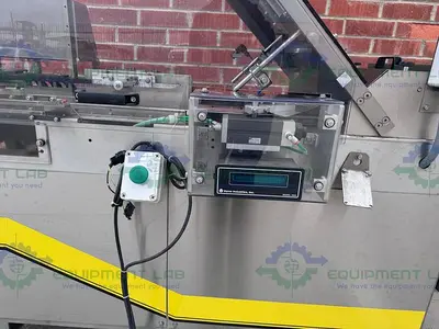 USED ECONOSEAL E SYSTEM 2000 ECONOSEAL CARTONER W/  HOT GLUE SEALING