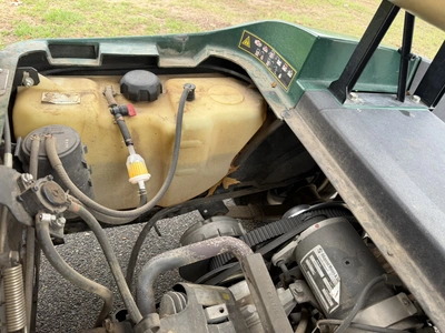 (1) 2015 E-Z-Go golf cart with a Kawasaki gas engine, does not include Club canopy, includes ball wa...