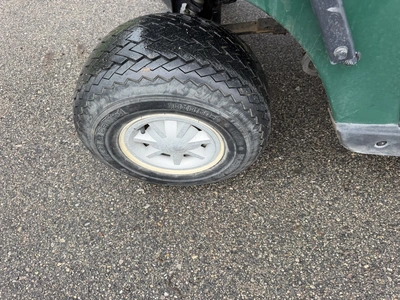 (1) 2015 E-Z-Go golf cart with a Kawasaki gas engine, does not include Club canopy, includes ball wa...