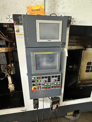 Used 2013 FUJI ANW 35 TWIN TURRET CNC LATHE, TAIL STOCK WITH ROBOT LOAD/UNLOAD AND STOCKER TABLES CNC Lathes | Harbor Machinery Inc. #1283394
