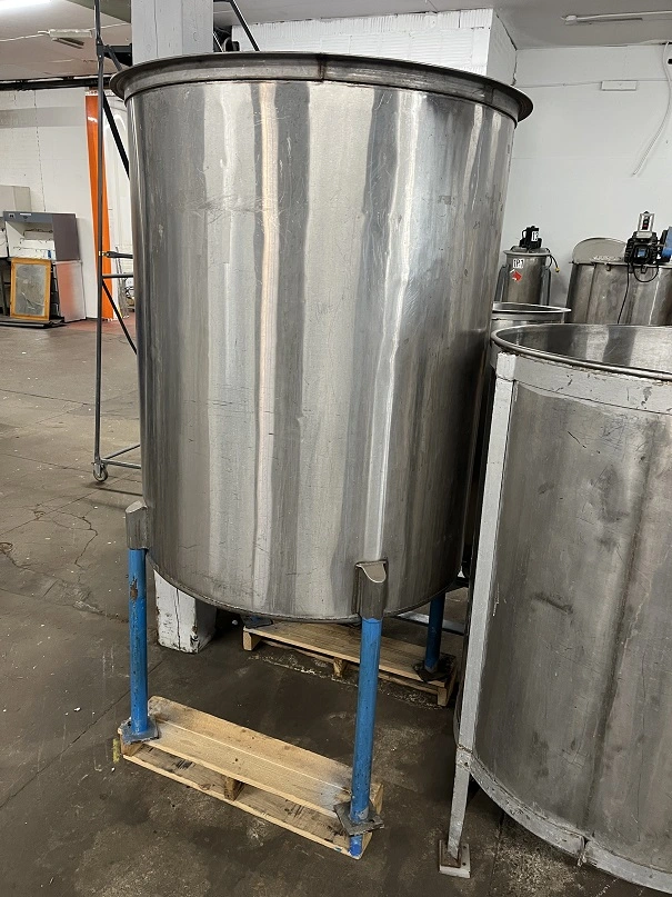 Used approximately 230 gallon stainless steel vertical tank