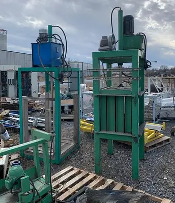 USED (2) CUSTOM-BUILT HYDRAULIC COMPACTORS