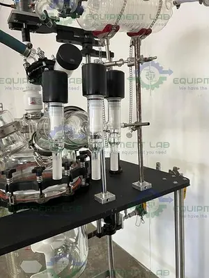 USED PRISM RESEARCH 20 LITER GLASS JACKETED REACTOR W/ 22 LITER COLLECTION FLASK