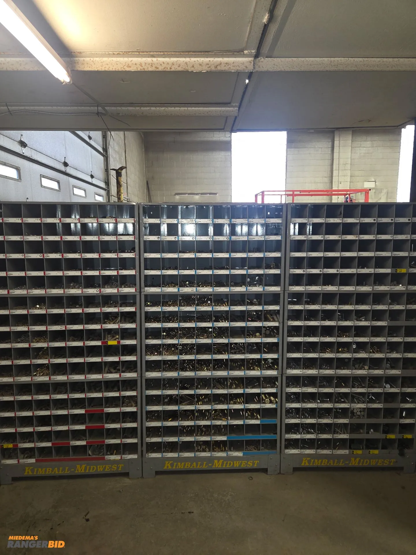 2 stacks of standard nuts, bolts, washers. 1 stack of metric nuts, bolts, washers. Comes with storag...