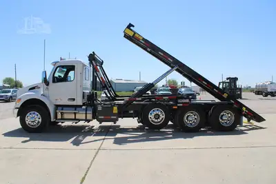 New | in-Stock 2027 PETERBILT 548 Rolloff Trucks Texas US | Roll Off Truck World #1492012