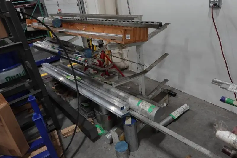 Storage Rack with Assorted Aluminum and Stainless