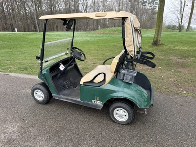 (1) 2015 E-Z-Go golf cart with a Kawasaki gas engine, includes ball washer and Club canopy, ball cov...