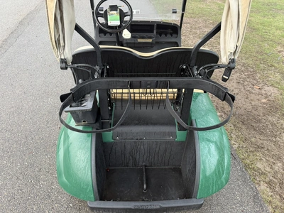 (1) 2015 E-Z-Go golf cart with a Kawasaki gas engine, includes canopy, ball cover, club cover, fold-...
