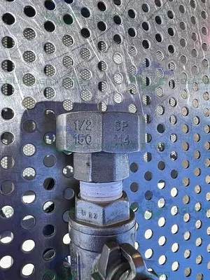 USED SVF CF8M 1000 WOG BALL VALVE W/ 1/2" HOSE FITTING