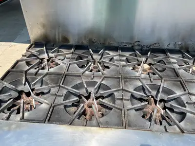 Used Comstock Castle Used Comstock-Castle 2F330 72" NG Range Cooktop w/ 12 Burners and 2 Ovens Commercial Ranges Illinois US | Falcon Restaurant Supply #1376040