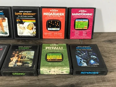 19 - Atari Video Games & 2 Paddle Controllers - see description for more info