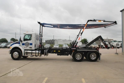 Used 2027 PETERBILT 548 Hooklifts & Roll-Offs Texas US | Roll Off Truck World #1491992