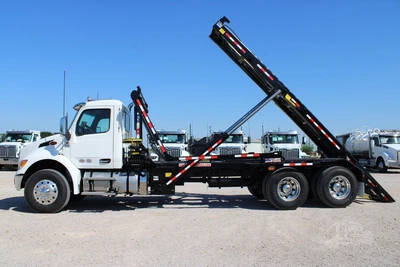 New | in-Stock 2027 PETERBILT 548 Hooklifts & Roll-Offs Texas US | Roll Off Truck World #1492004