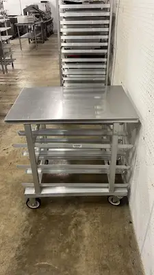 New | in-Stock New Age Used New Age 1235 35"H Mobile Can Rack w/ (54) #10 or (72) #5 Capacity - STS Food Storage & Transportation Illinois US | Falcon Restaurant Supply #1373588