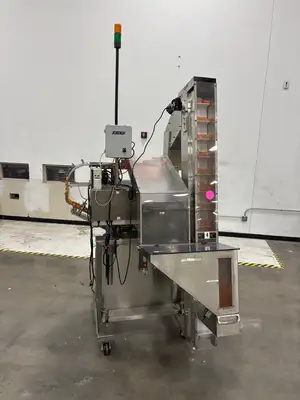 USED SUREKAP SK6000 CAPPER AND ELEVATOR