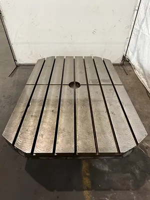 84" X 60" STONE CO ROTARY TABLE. STOCK # 1120524