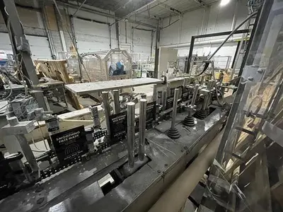 Bartelt model IM7 Pouch Packager with AMS Auger Filler and  liquid filler