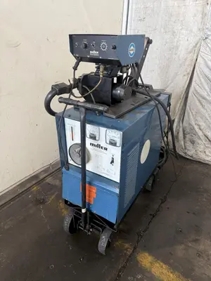 USED MILLER CP–300