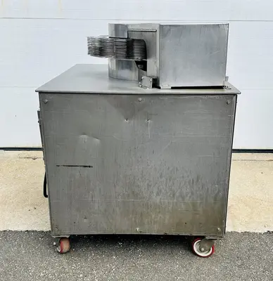 USED URSCHEL 10 STATION SEMI-AUTOMATIC ROTATING ONION SLICER