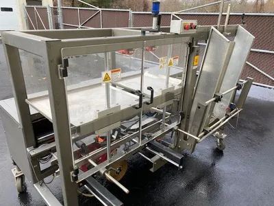 Used COMBI PACKAGING SYSTEMS LLC, CANTON OH 2EZ Case Erectors - Tape Bottom Seal Pennsylvania US | Libra Machine #1568350