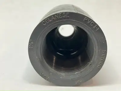 USED CELANESE 1-1/4" X 1/2" REDUCER BUSHING FLUSH STYLE PVC-I NSF 3-3/16" OAL