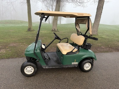 (1) 2015 E-Z-Go golf cart with a Kawasaki gas engine, includes canopy, ball cover, club cover, fold-...
