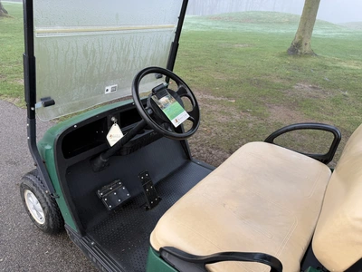 (1) 2015 E-Z-Go golf cart with a Kawasaki gas engine, includes canopy, ball cover, club cover, fold-...