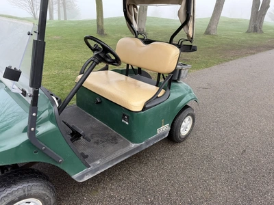 (1) 2015 E-Z-Go golf cart with a Kawasaki gas engine, includes canopy, fold-down windshield, and bal...