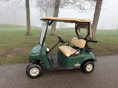 (1) 2015 E-Z-Go golf cart with a Kawasaki gas engine, includes canopy, ball cover, club cover, fold-...