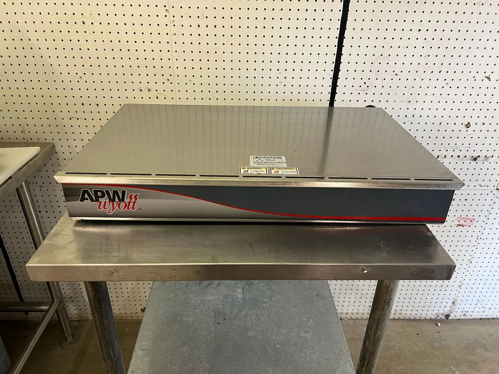 New | in-Stock APW Wyott New APW Wyott SPTU-50N Heat and Hold Hot Dog Warming Drawer 120V Hot Food Warming, Holding, & Transport Cabinets Illinois US | Falcon Restaurant Supply #1375620