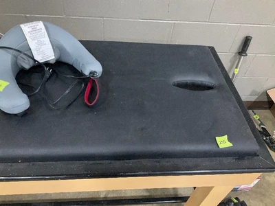Massage table and neck massager