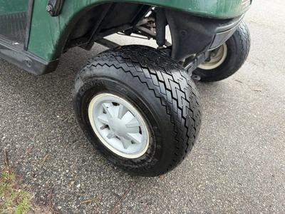 (1) 2015 E-Z-Go golf cart with a Kawasaki gas engine, includes canopy, ball cover, club cover, fold-...