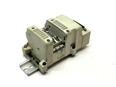VV5QC11-03N3FD0-DS | SMC  Plug-In Base Manifold - Used