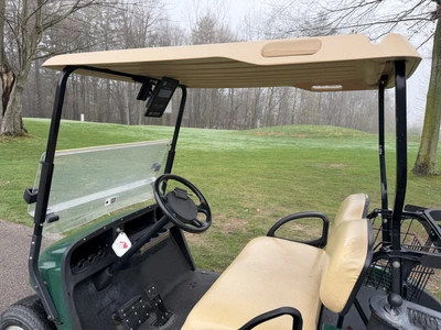 (1) 2015 E-Z-Go golf cart with a Kawasaki gas engine, does not include Club canopy, includes ball wa...