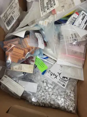 Box of Assorted Electronic Connectors, Resistors, and Hardware Components