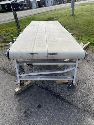 USED AUTOMATED CONVEYOR SYSTEMS CASE CONVEYOR