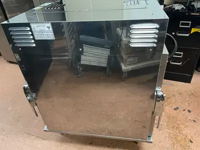 Used Henny Penny Used Henny Penny HC-903 CDT Heated Holding Pass Thru Cabinet with Flip Doors and Timers 120V Hot Food Warming, Holding, & Transport Cabinets Illinois US | Falcon Restaurant Supply #1375758