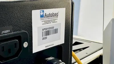 NEW 2020 AUTOMATED PACKAGING SYSTEMS AUTOBAG 600 W/ POWERED OUT-FEED CONVEYOR