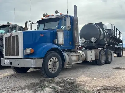 USED 2013 PETERBILT TRANSPORT TRUCK PETERBILT
